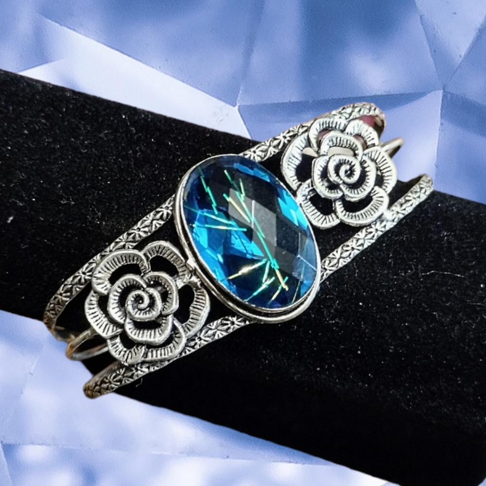 Silver Floral Cuff Bracelet with Blue Crystal Center